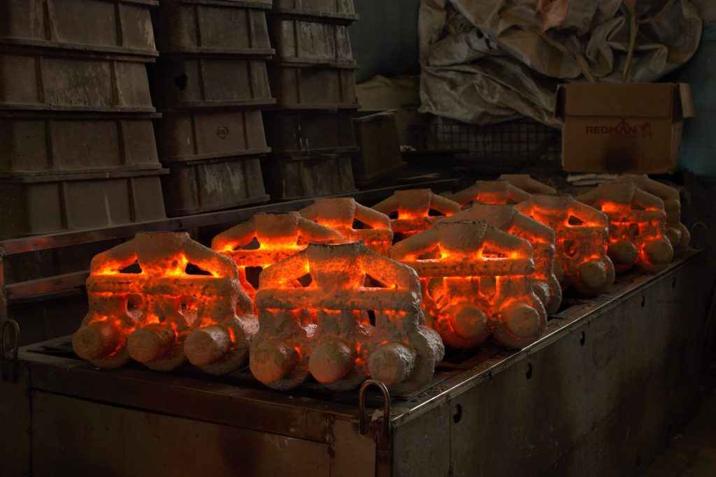Ceramic investment casting shells glowing after preheat
